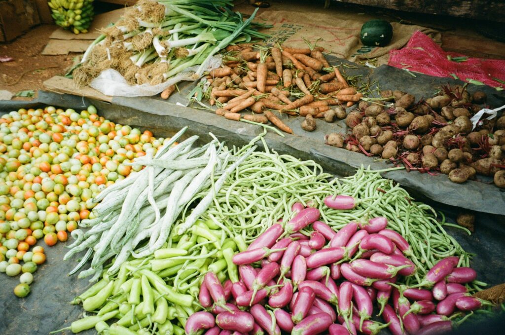 A colorful assortment of fresh vegetables at a market stall