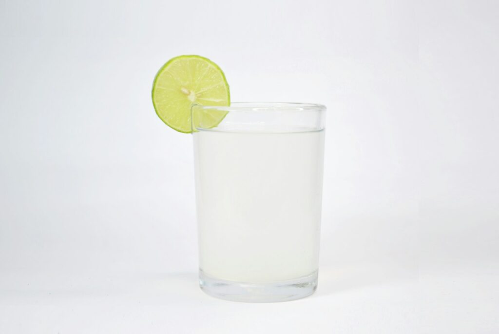 Clear drinking glass with lemon