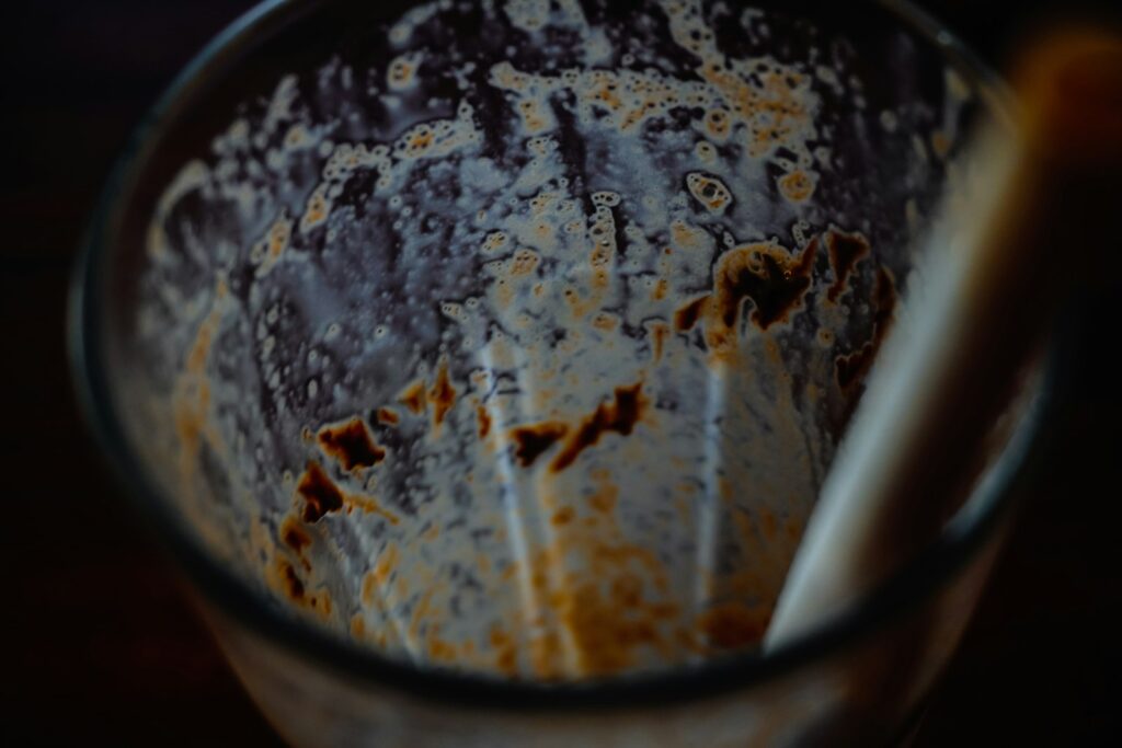 Dirty glass with remnants of a drink