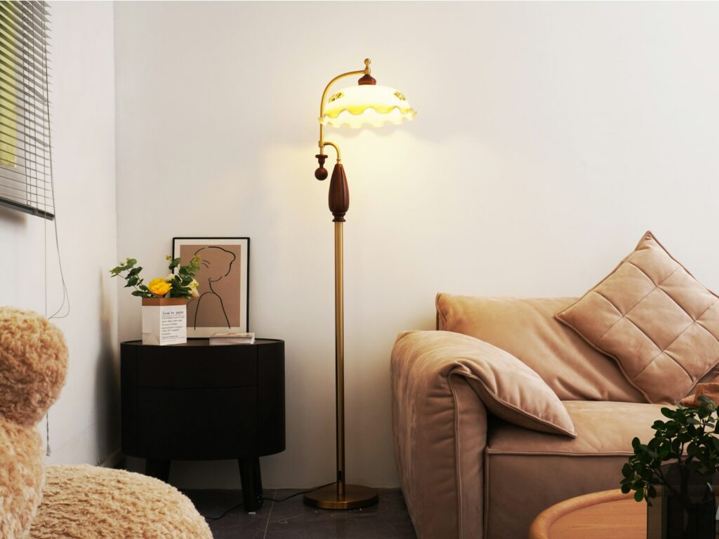 Vintage floor lamp with ornate glass shade