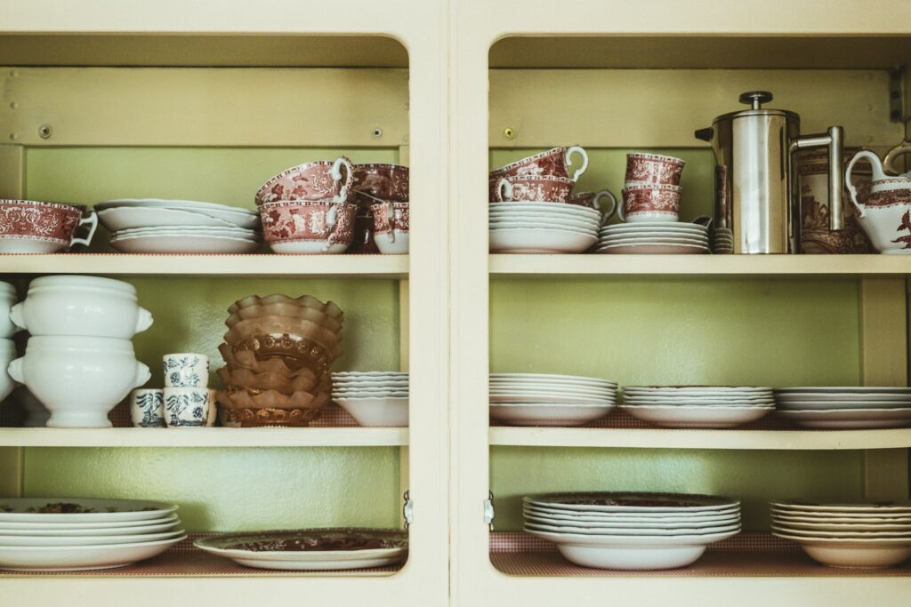 White ceramic bowl on brown wooden cabinet