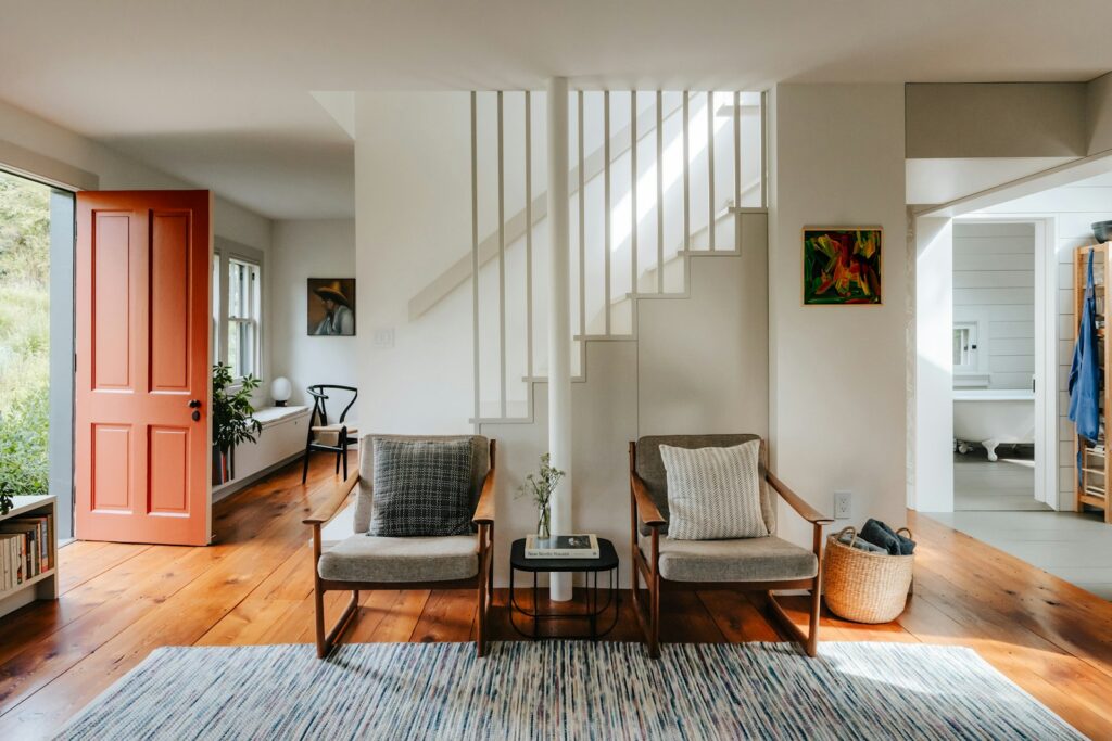 A living room filled with furniture and lots of windows