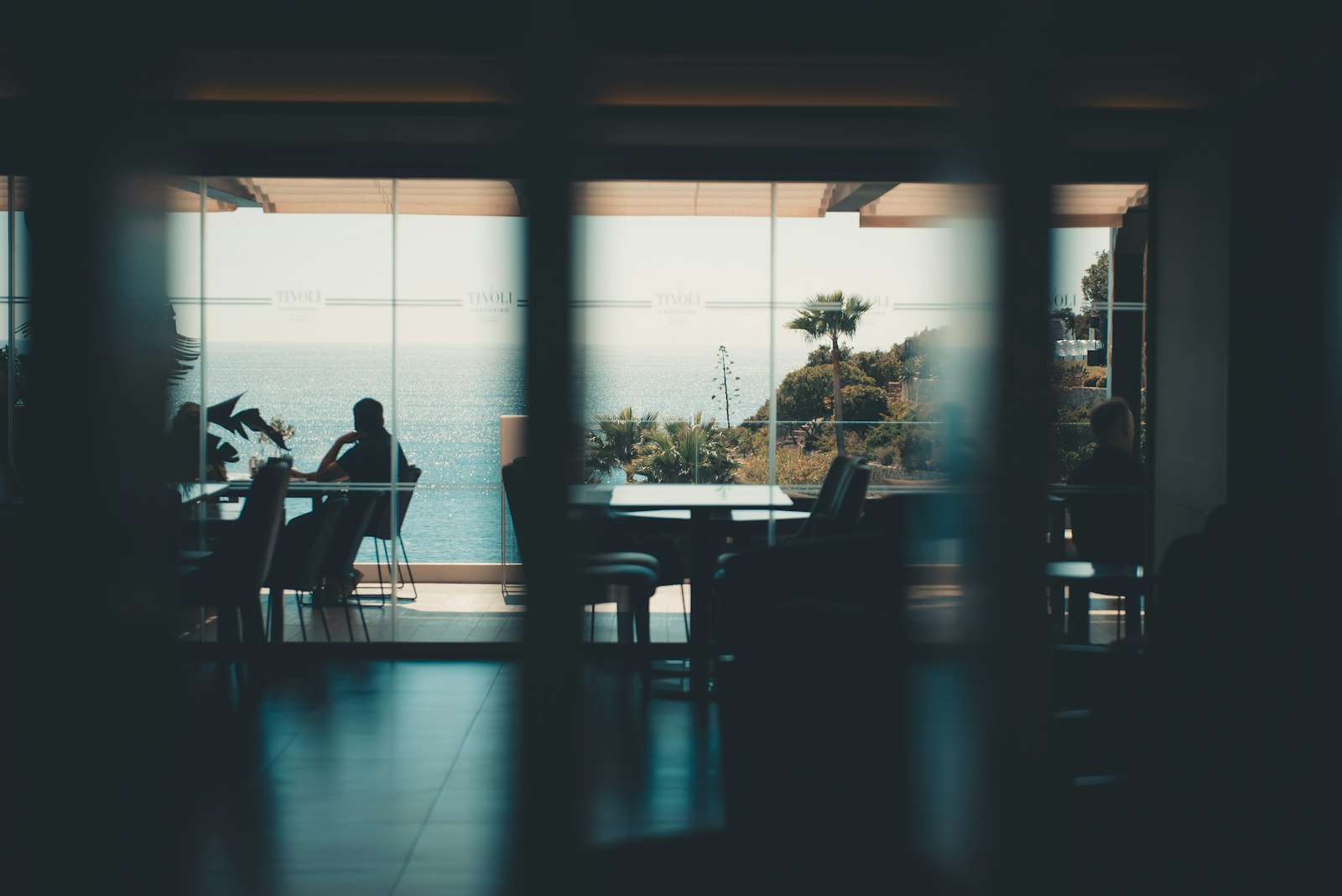Dining room with a scenic, outdoor ocean view