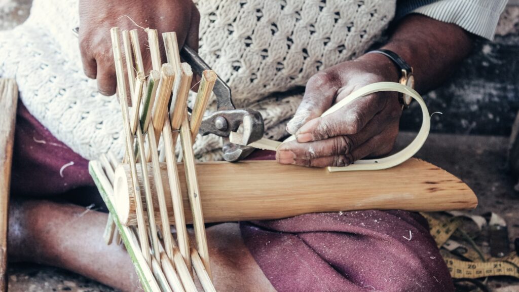 A person cutting wood