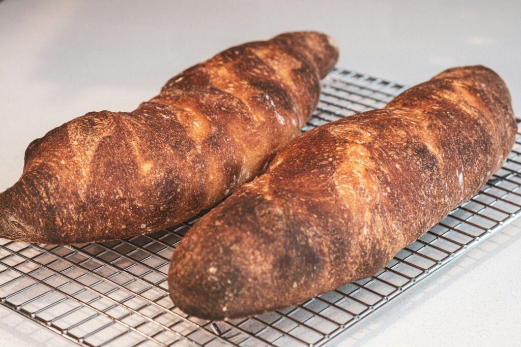 Brown bread on white and black checkered textile