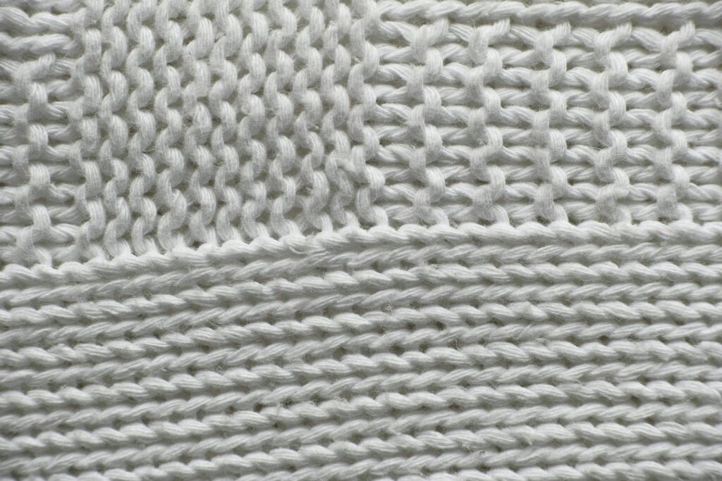 White knit textile on white surface