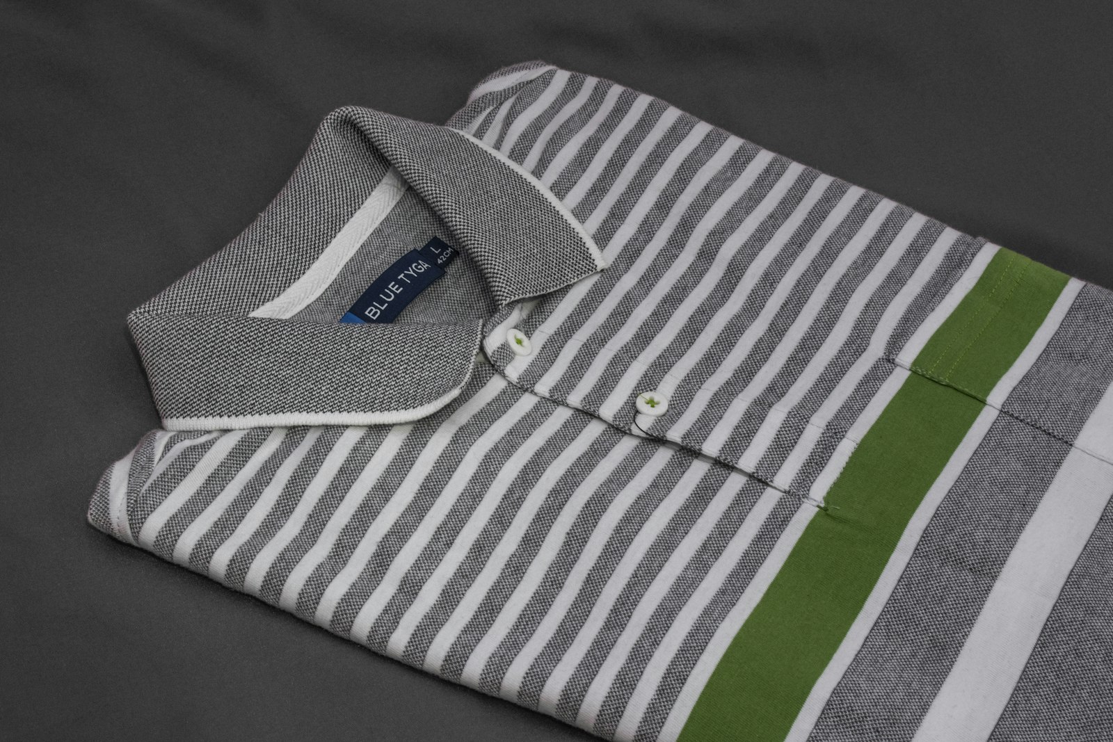 White and green striped polo shirt