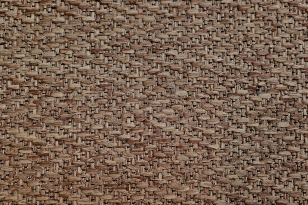 Close-up of woven brown fabric texture