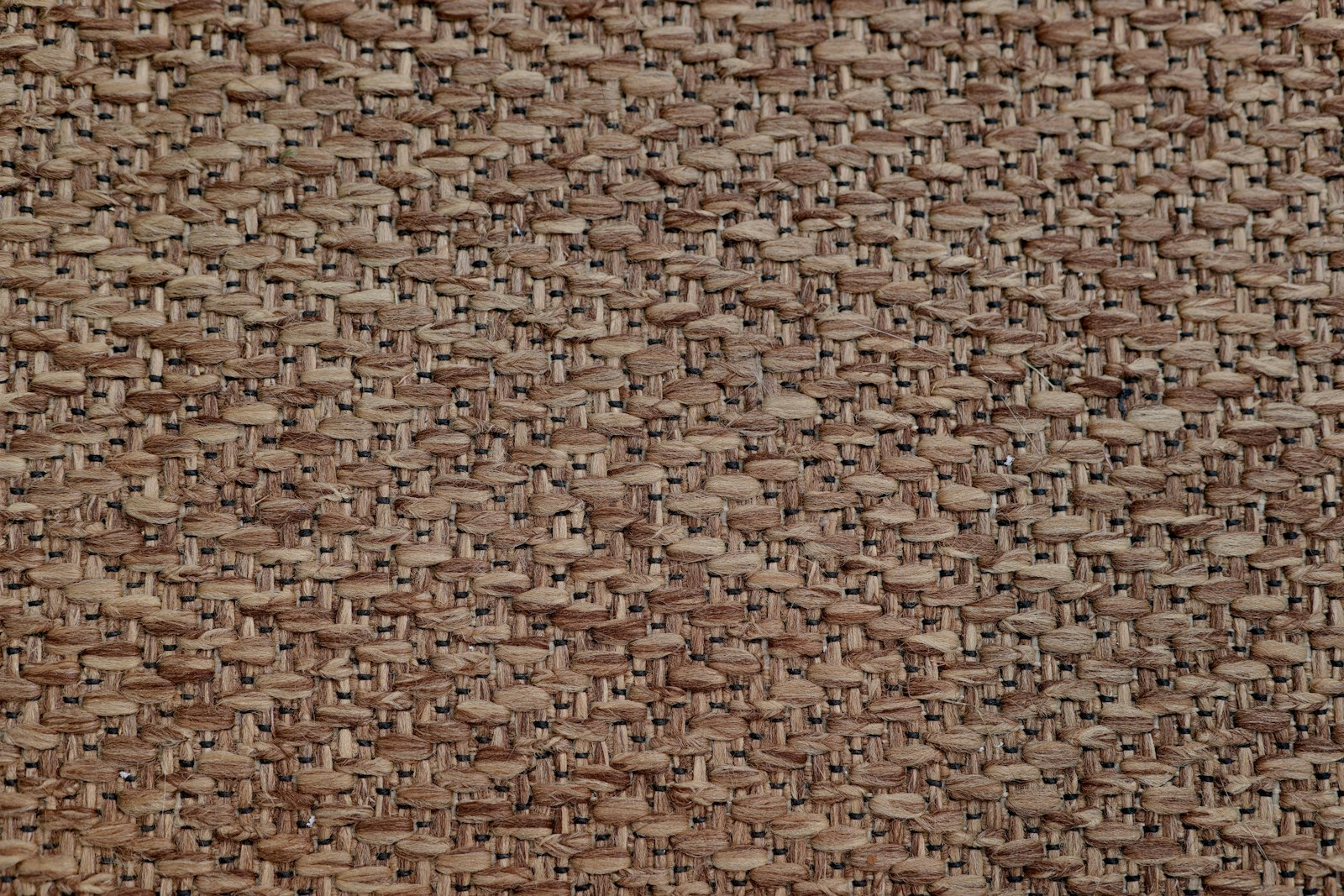 Close-up of woven brown fabric texture