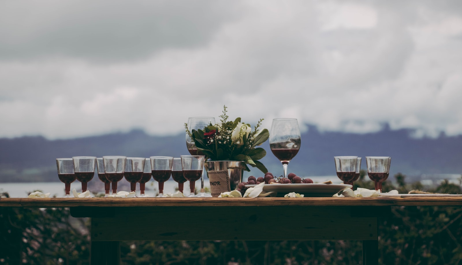 Clear wine glass on brown wooden table
