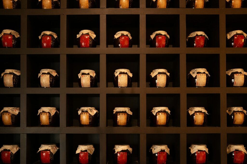 A wall with a bunch of vases on it