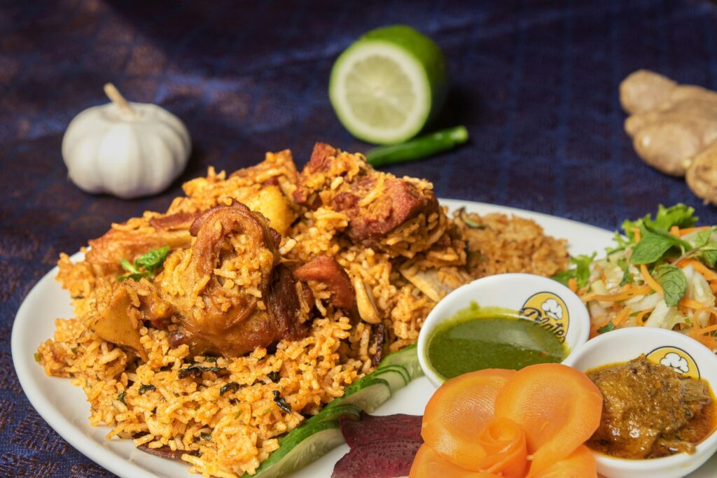 A white plate topped with rice and vegetables