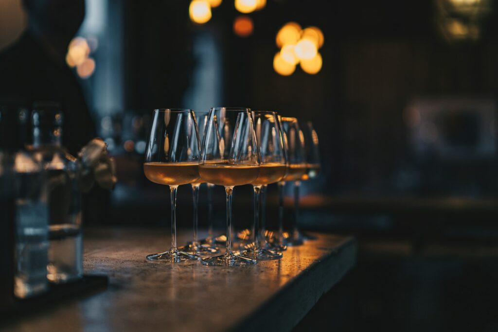 A group of glasses with liquid in them