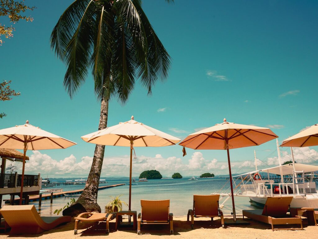 Beach chairs and umbrellas on a tropical island
