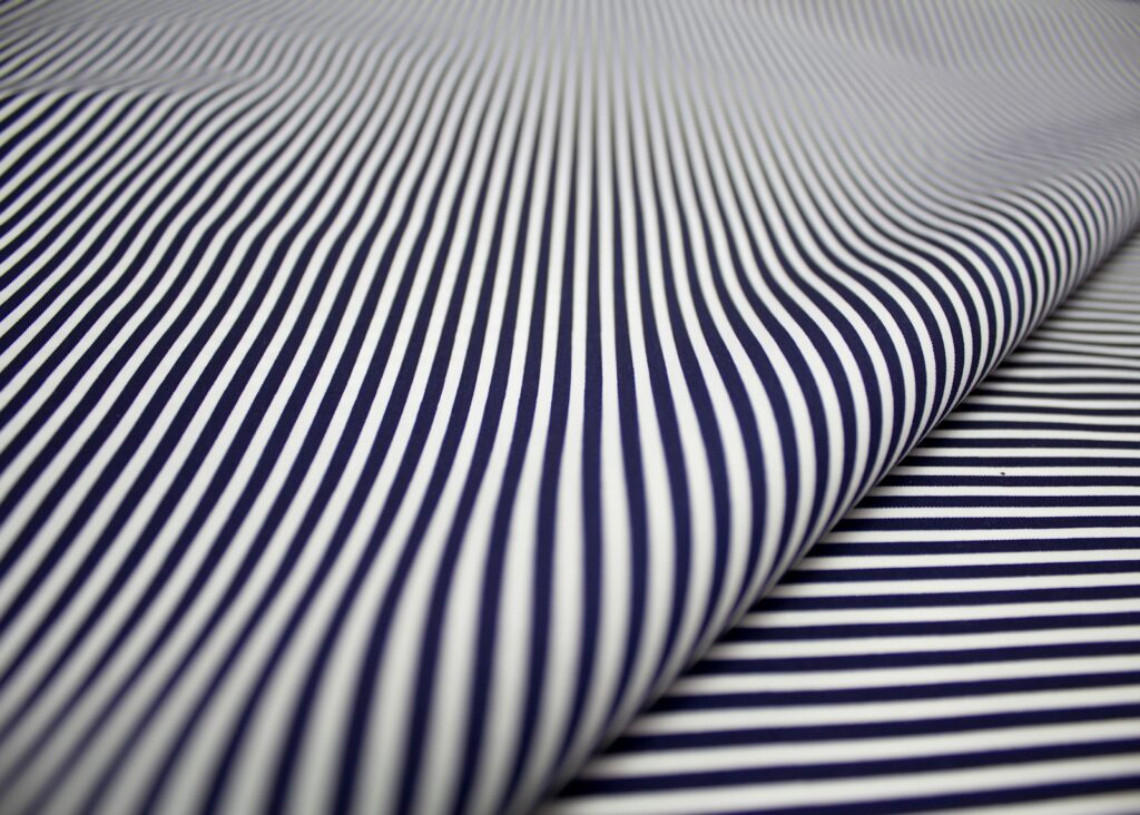 White and black striped textile