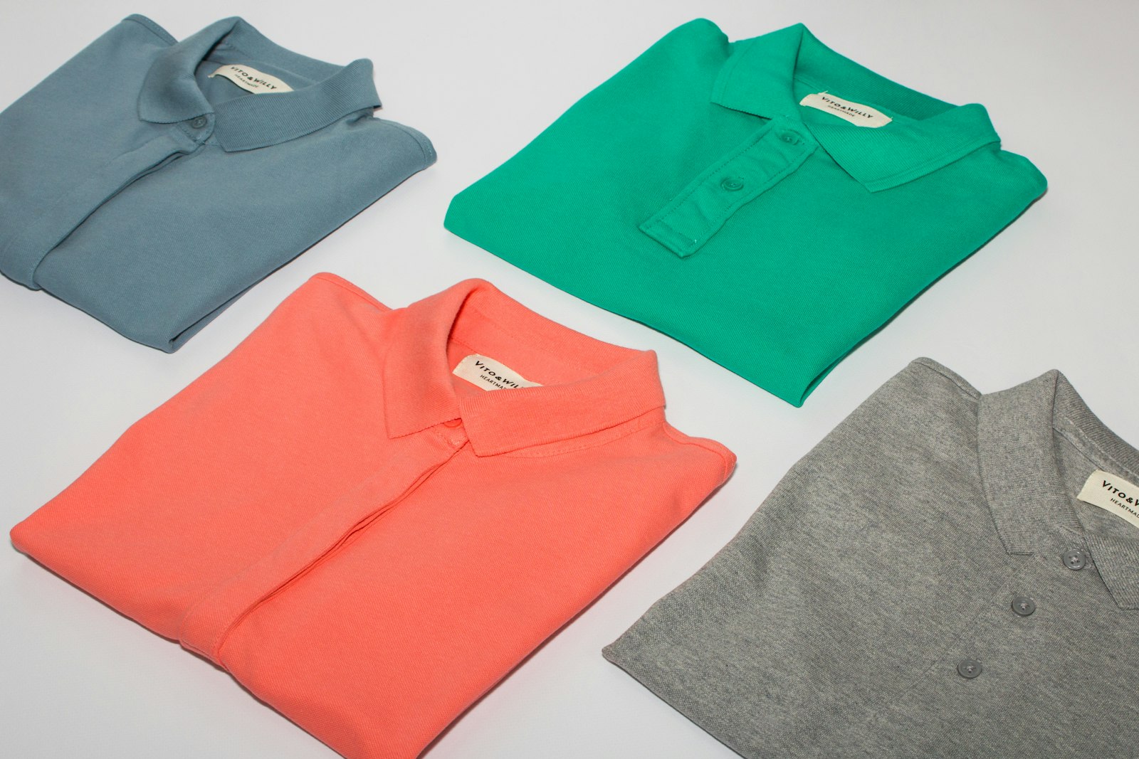 Green crew neck shirt and gray crew neck shirt