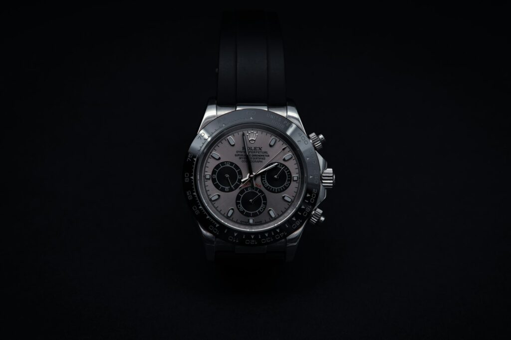 A luxury watch against a black background