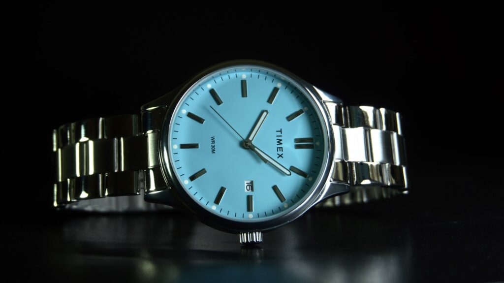 A watch sitting on top of a table