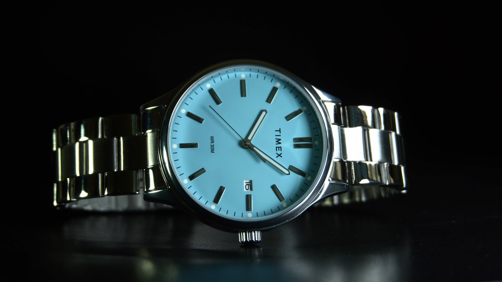 A watch sitting on top of a table
