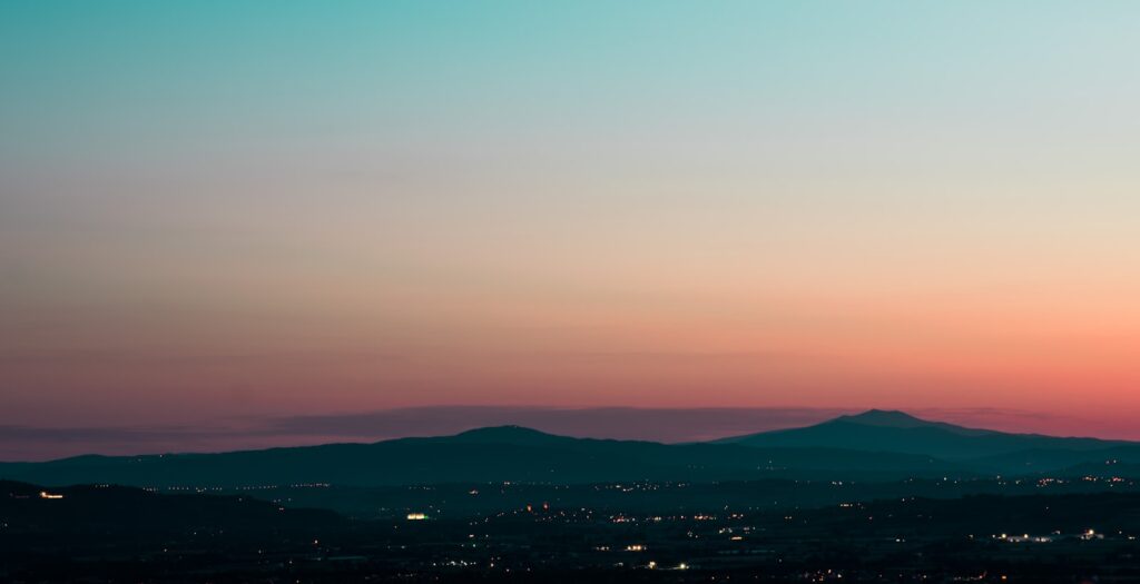 Mountain range under clear blue sky