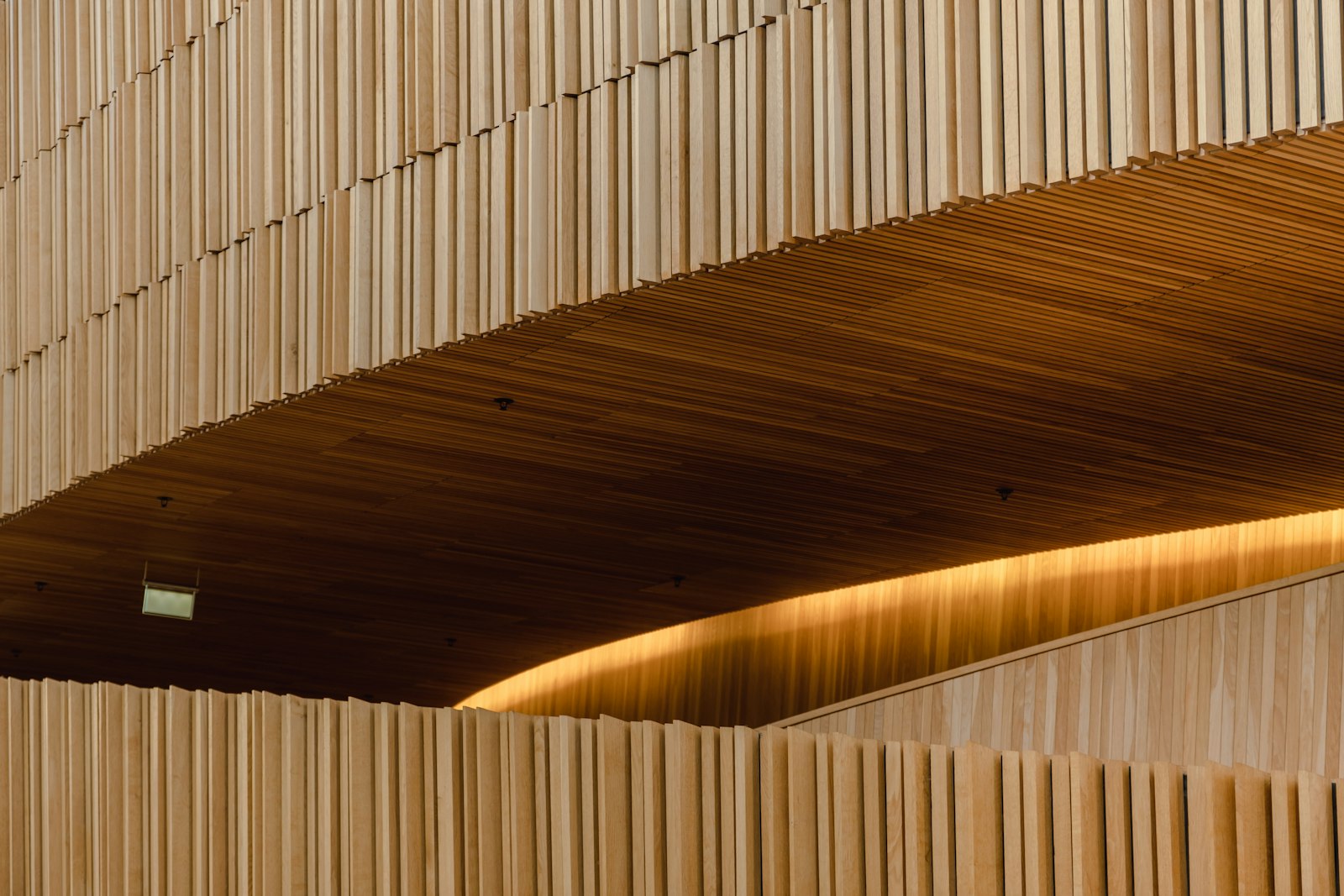 A wooden ceiling with a light