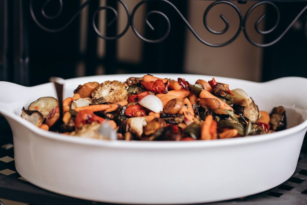 Cooked food in white ceramic bowl