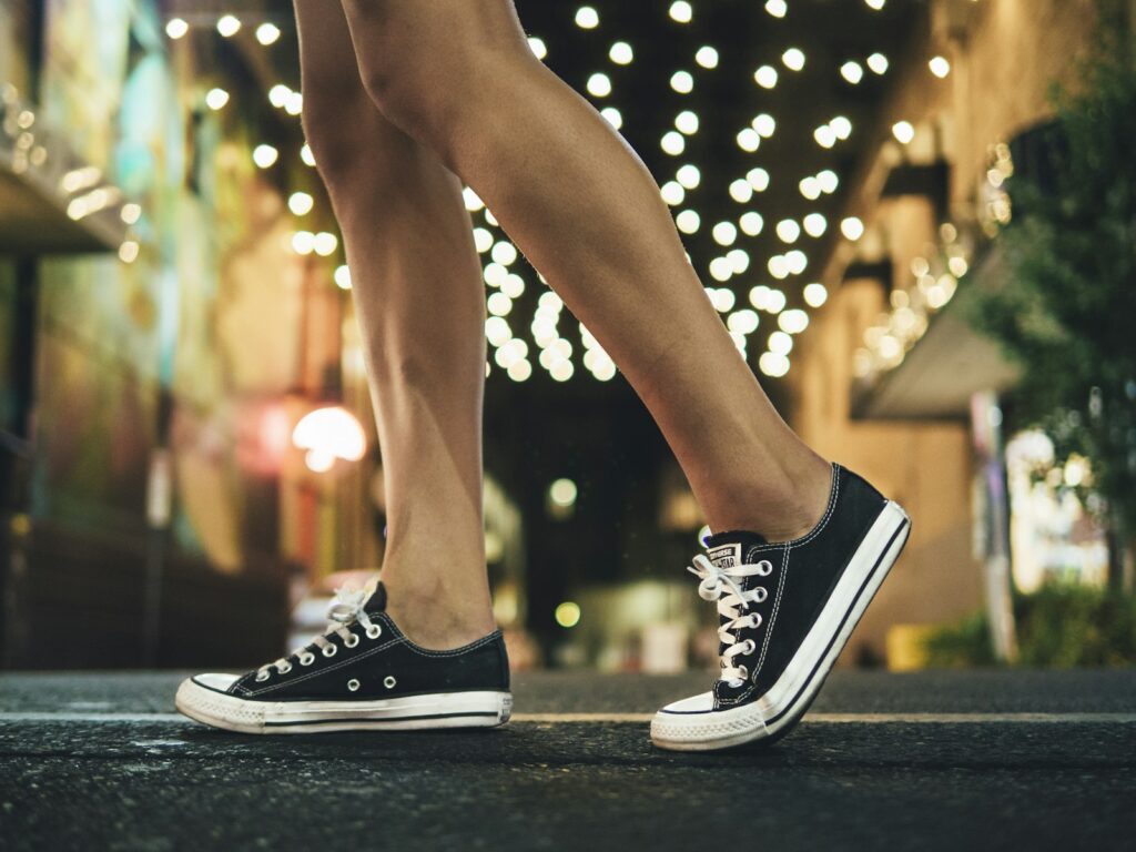 Person wearing black-and-white low-top sneakers
