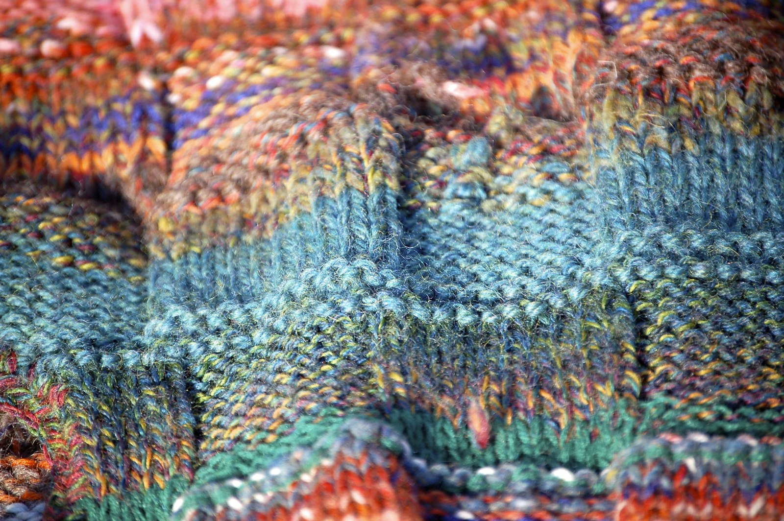 Blue green and red knit textile