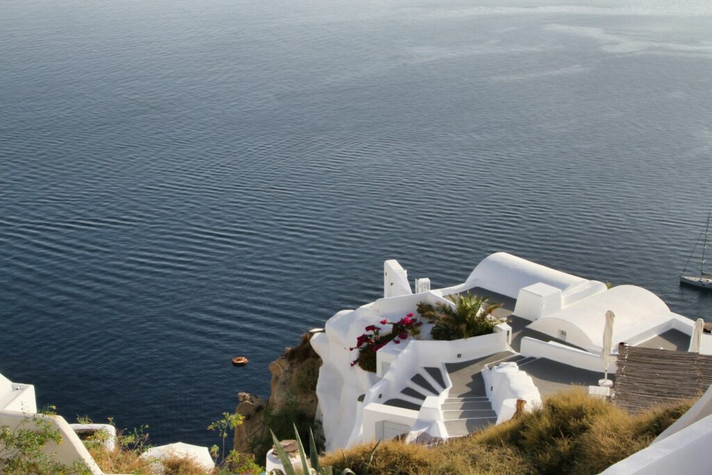 White buildings overlooking the deep blue sea
