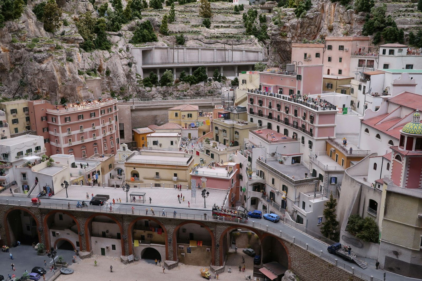 Detailed miniature town built into a scenic hillside