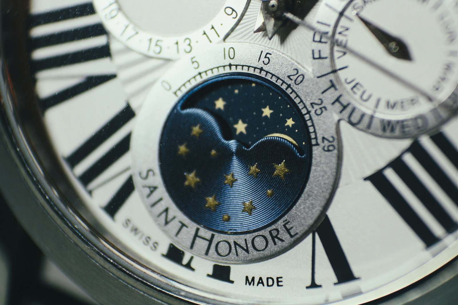 Silver and blue round pocket watch