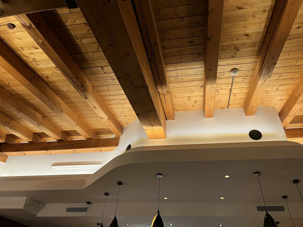 Why Hand-Adzed Beams Belong in the Home