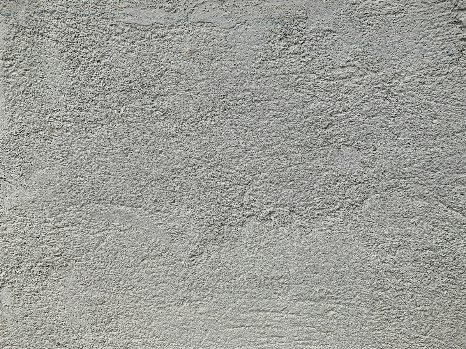 A cement wall with a white background