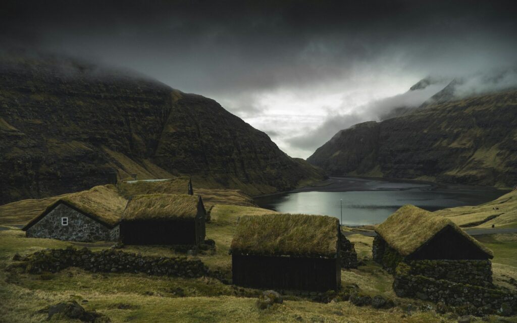 Concrete houses near body of water