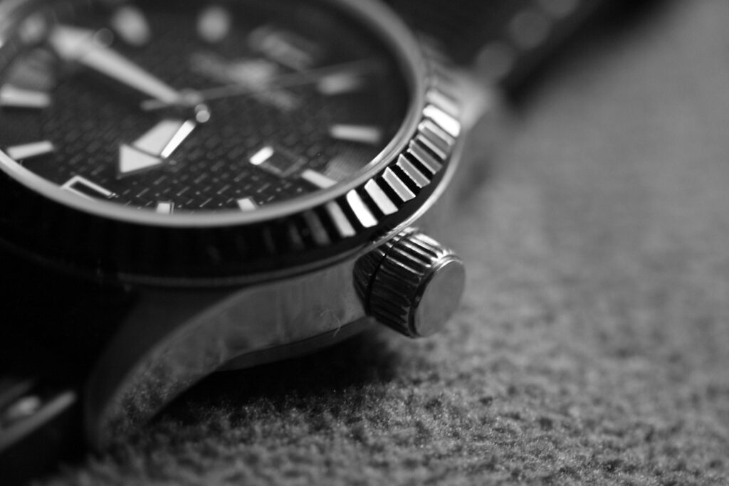 A black and white photo of a watch